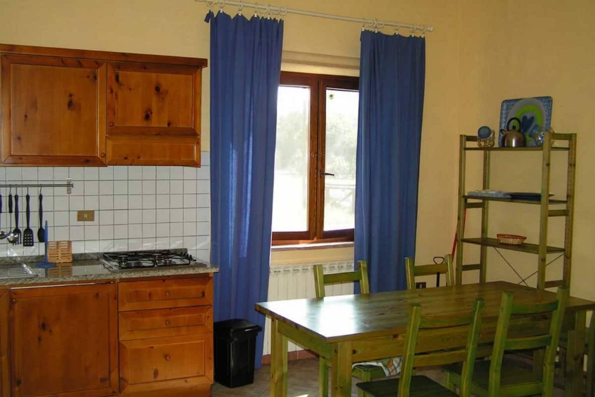Family Apartment, 1 Bedroom, Accessible, Garden View | Living area | 24-inch LCD TV with digital channels, TV