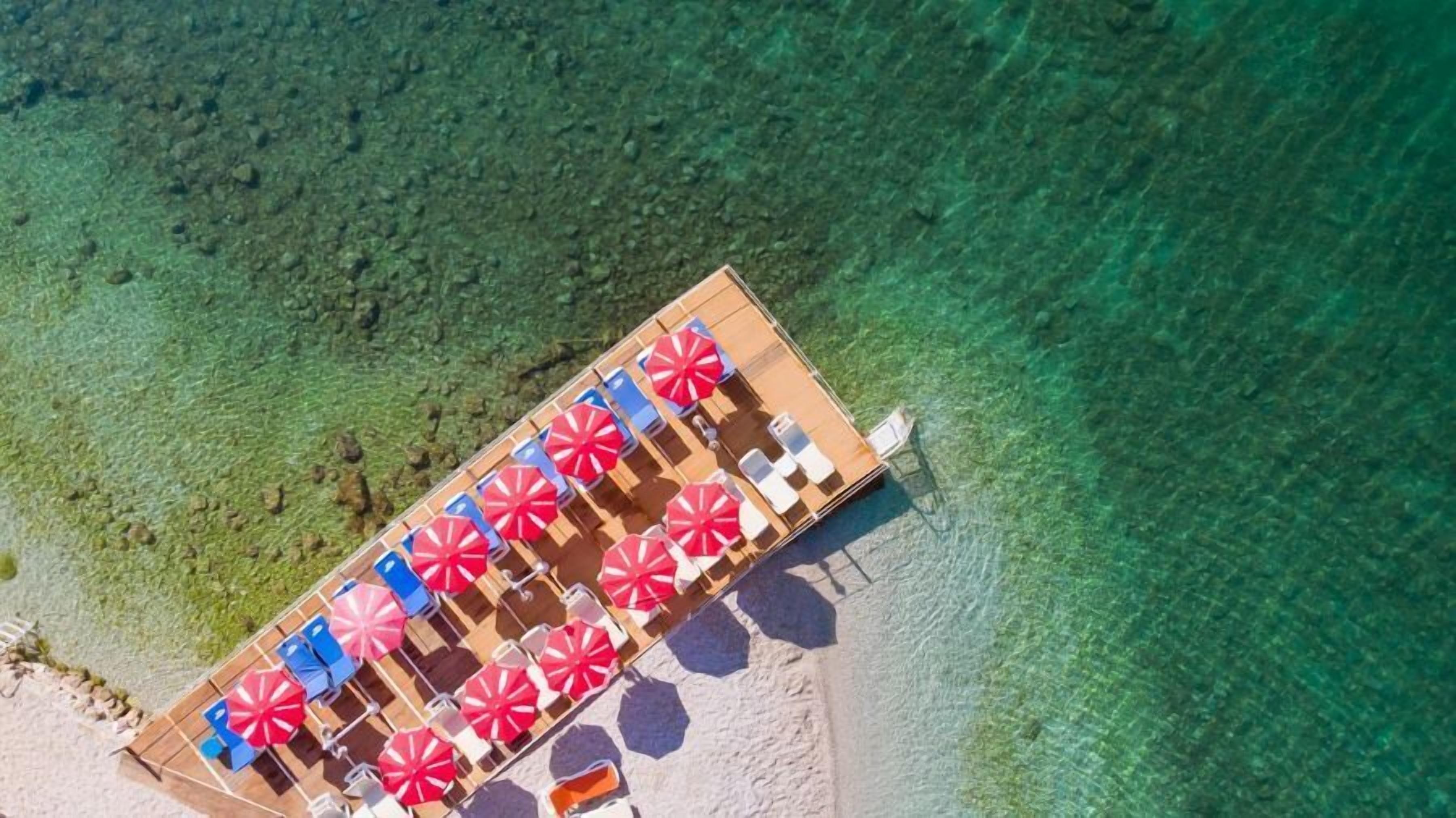 private beach, white sand, beach shuttle, sun-loungers