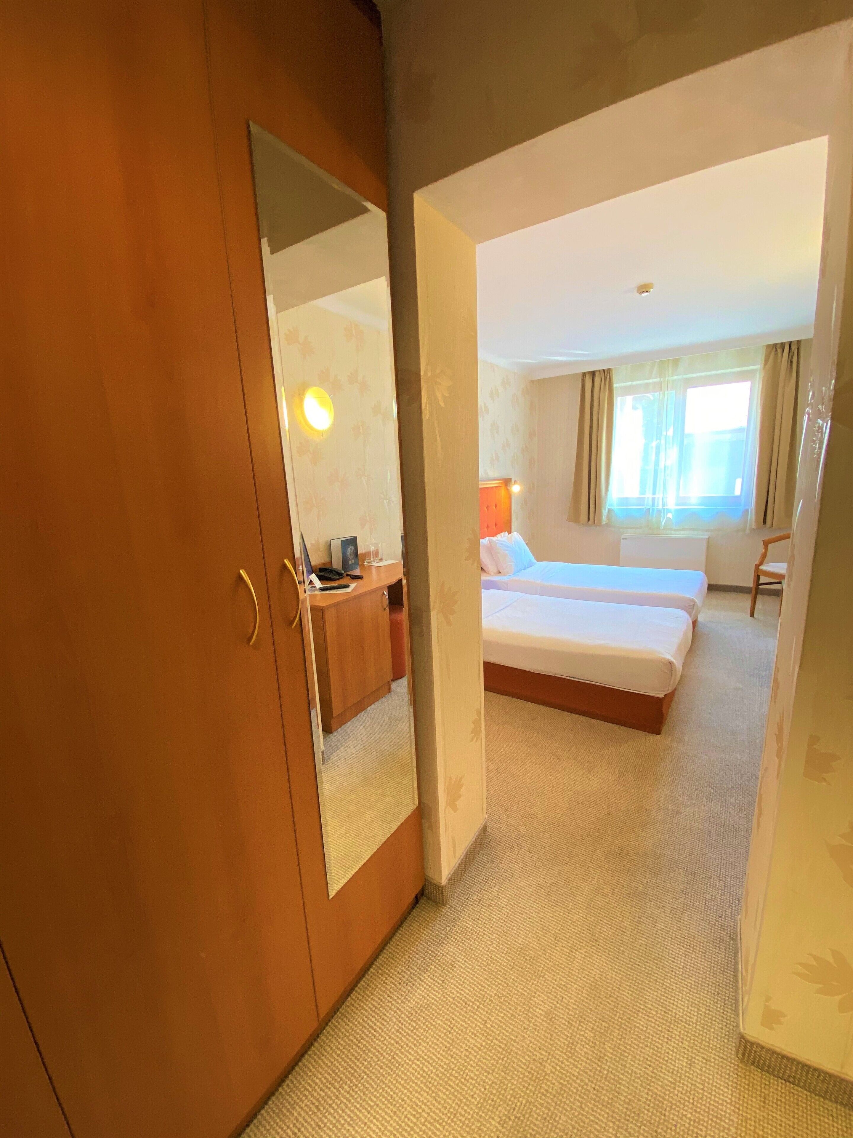 double or twin room (free fitness and sauna ) | minibar, desk, blackout curtains, soundproofing