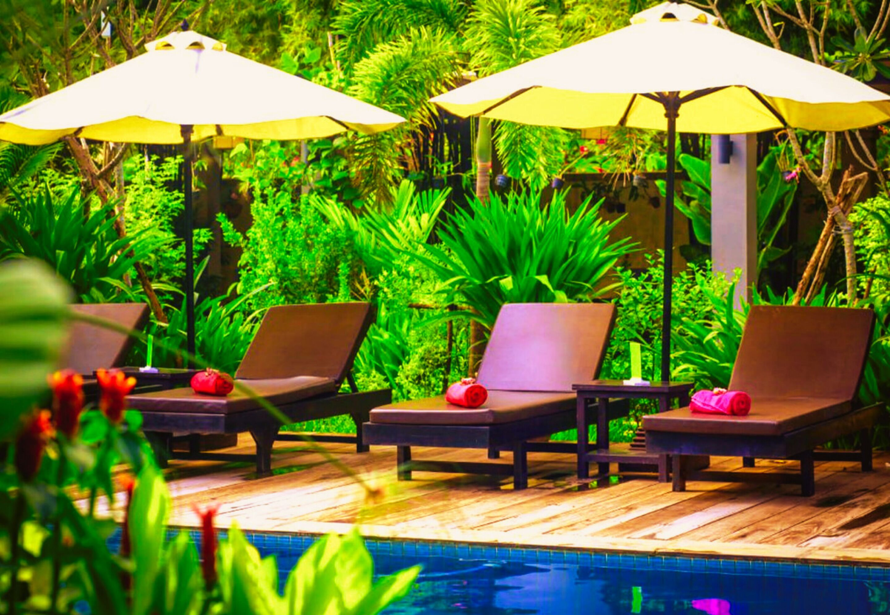 2 outdoor pools, open 9:00 am to 10:00 pm, pool umbrellas, pool loungers