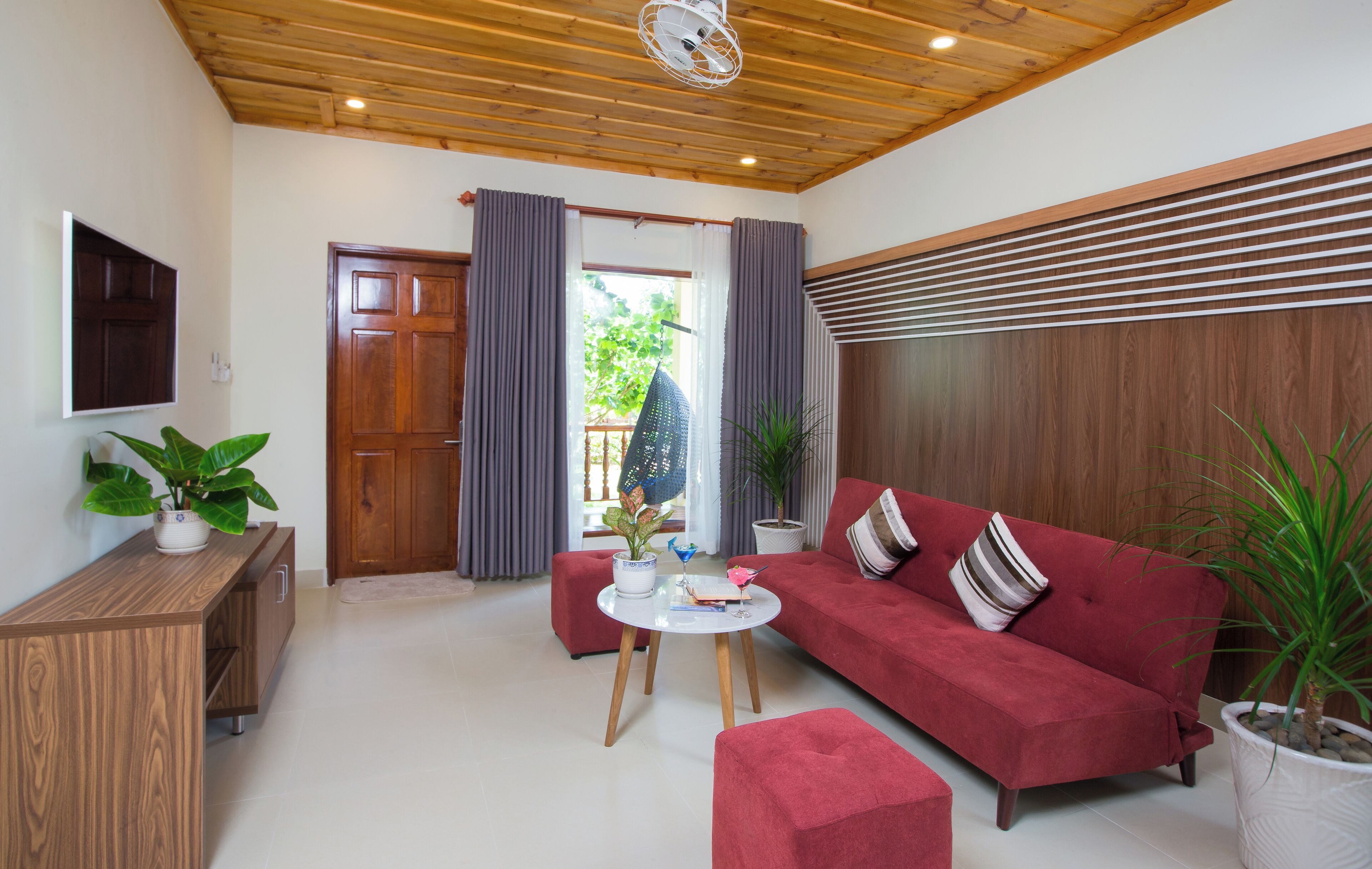 family villa | living area | 40-inch flat-screen tv with cable channels, tv