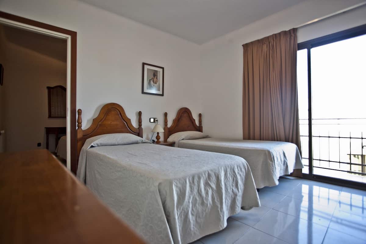 Desk, free cots/infant beds, free WiFi, bed sheets