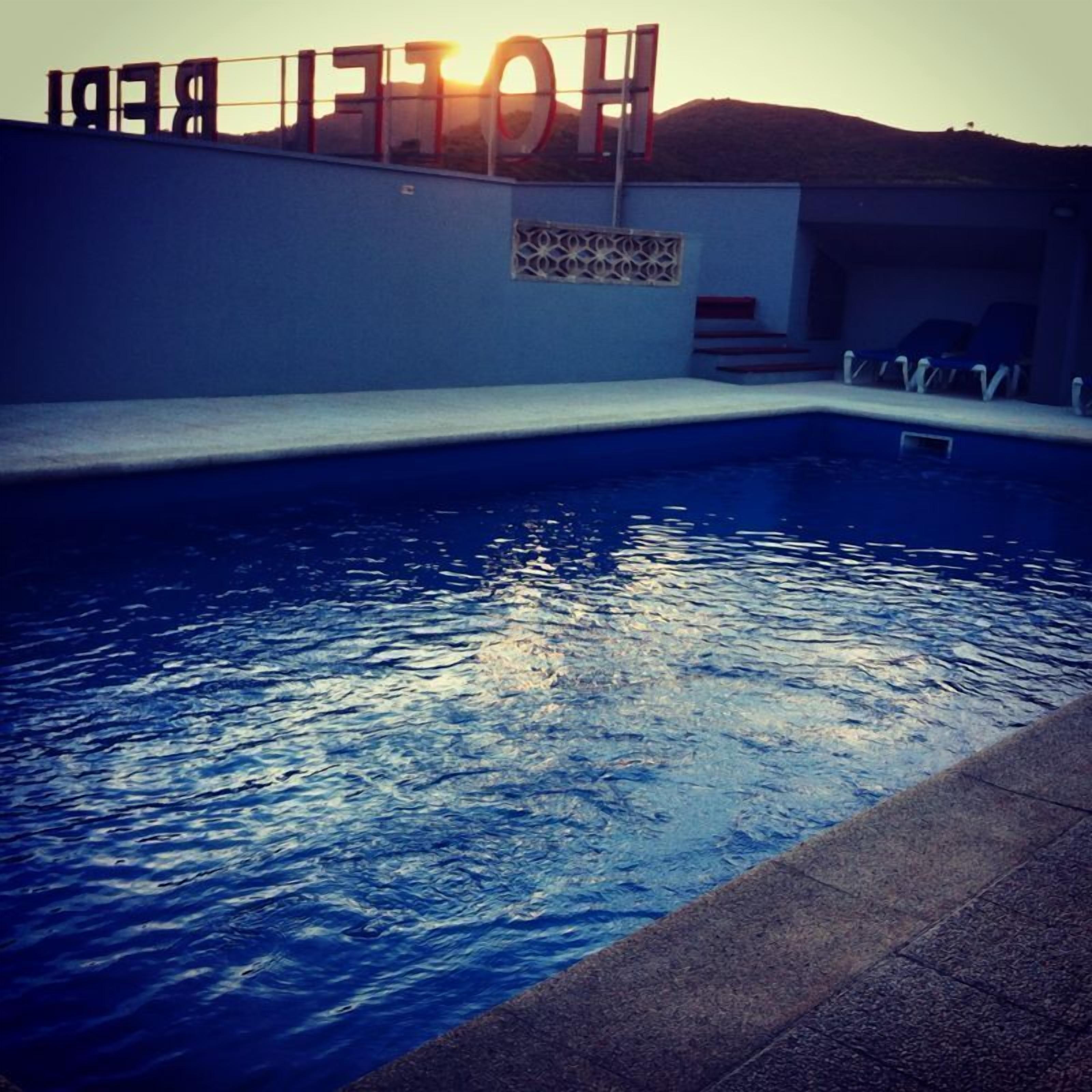 outdoor pool, pool loungers