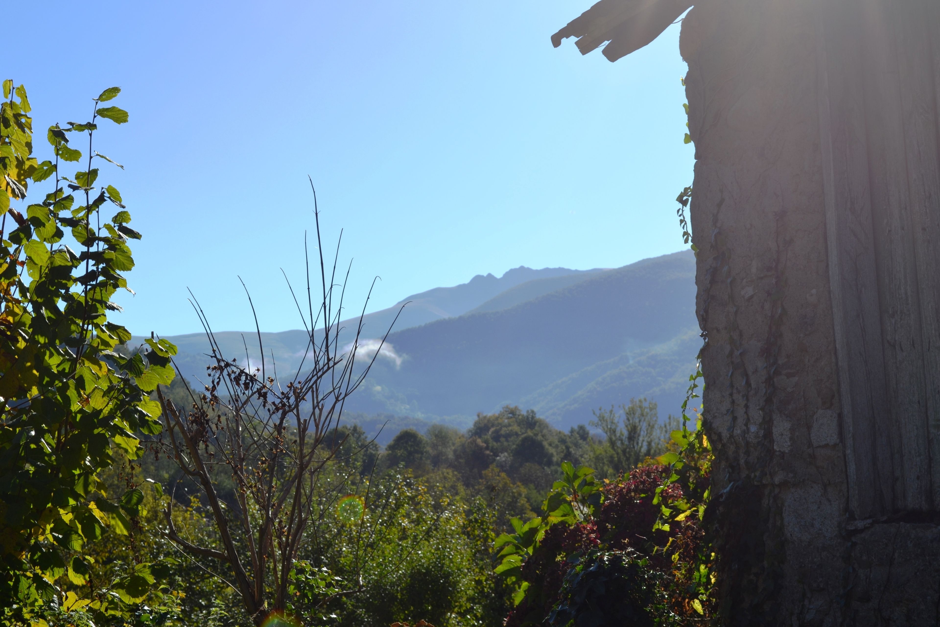A mountainous landscape with a clear sky.