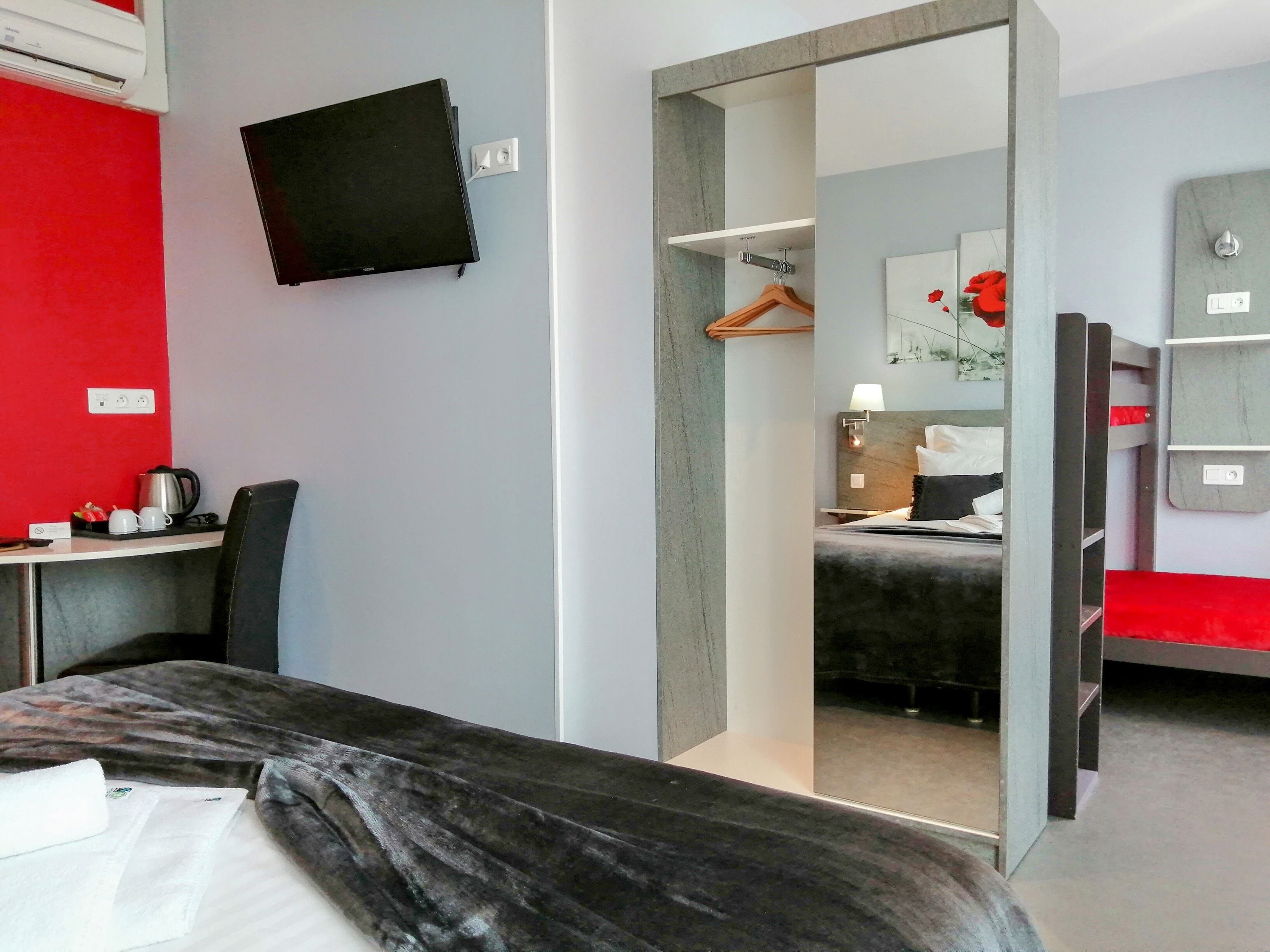 family room | premium bedding, desk, soundproofing, iron/ironing board