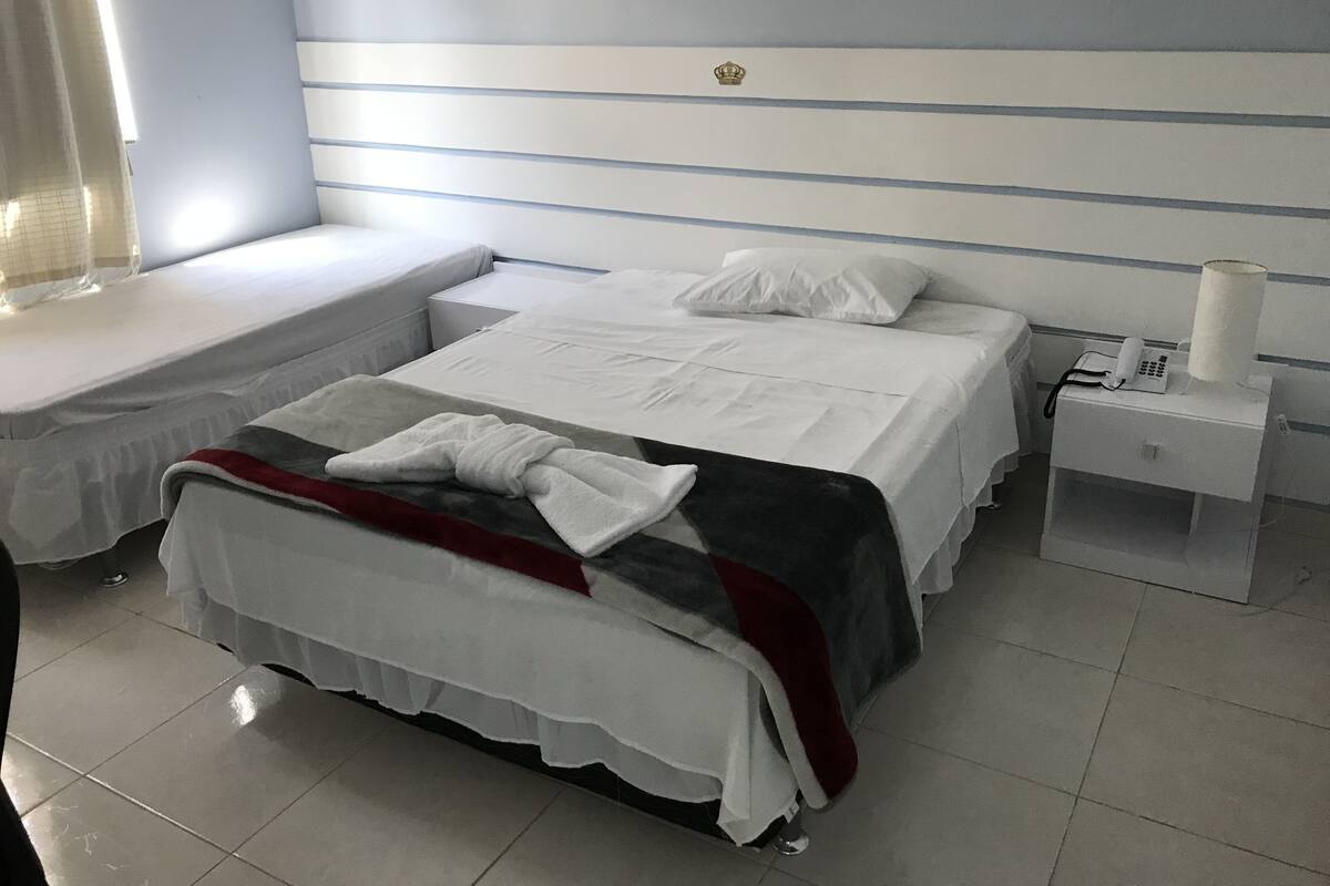 Standard Double Room | Minibar, desk, blackout curtains, rollaway beds