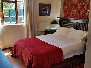 Ground level double room en suite | Individually decorated, desk, iron/ironing board, free WiFi