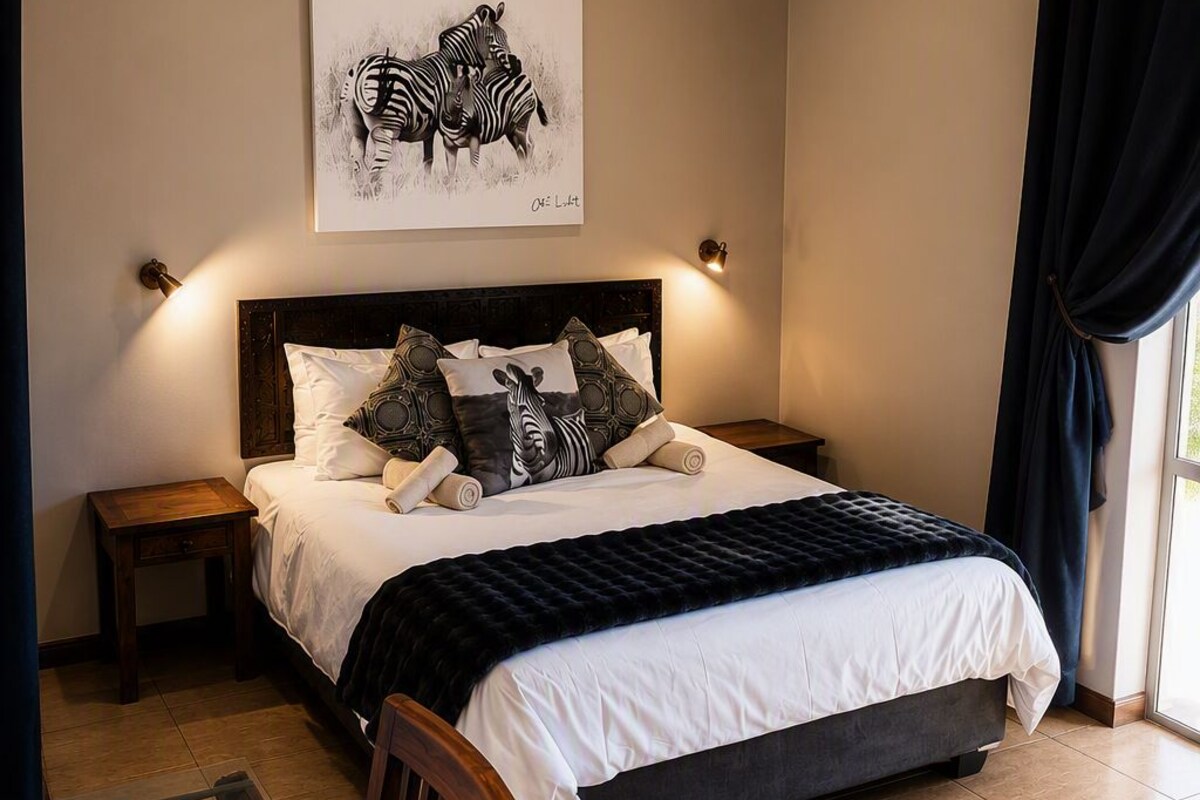 Premium bedding, down comforters, in-room safe, blackout drapes