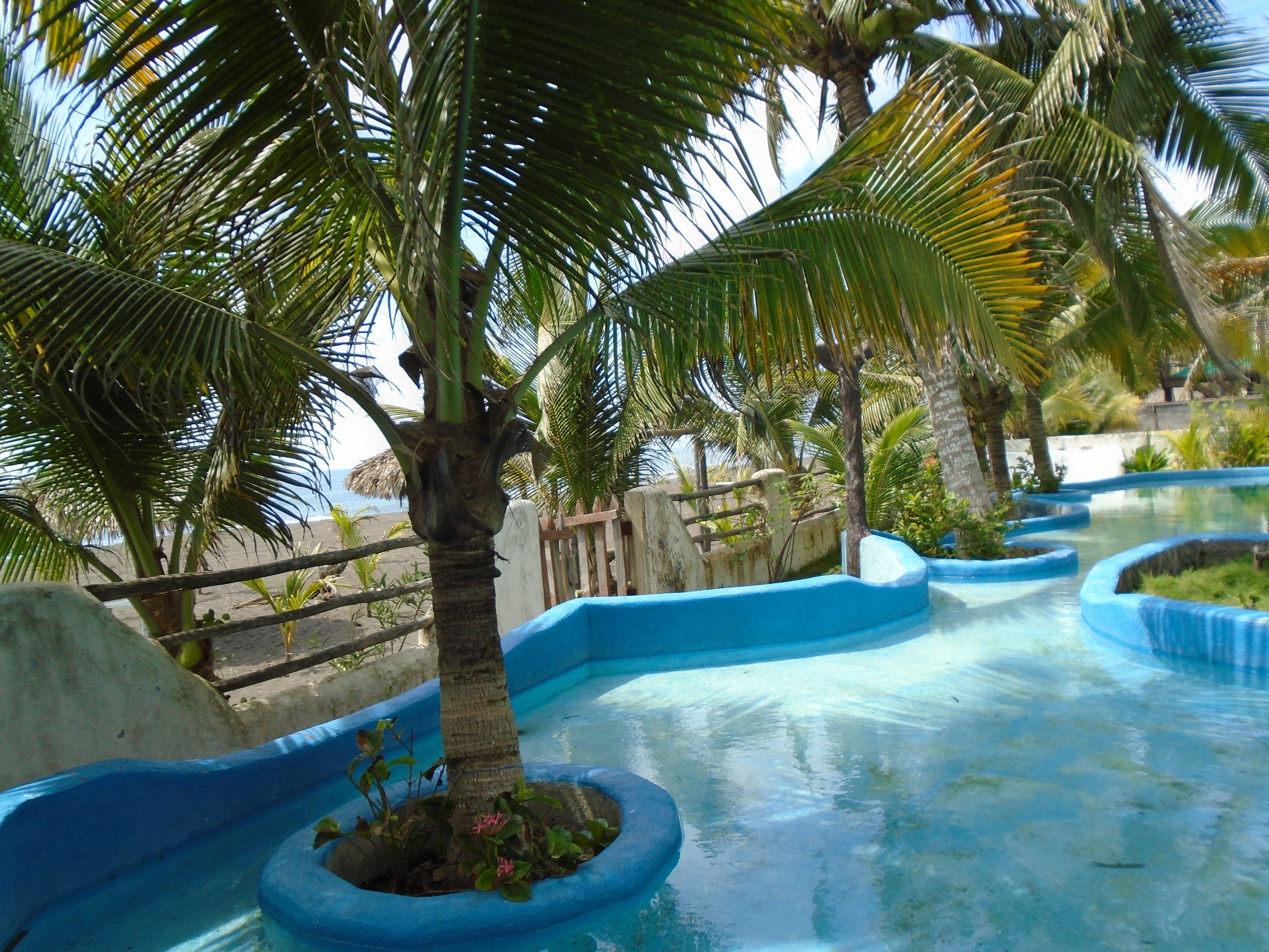 Outdoor pool, open 8:00 AM to 10:00 PM, sun loungers