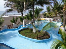 Outdoor pool, open 8:00 AM to 10:00 PM, sun loungers