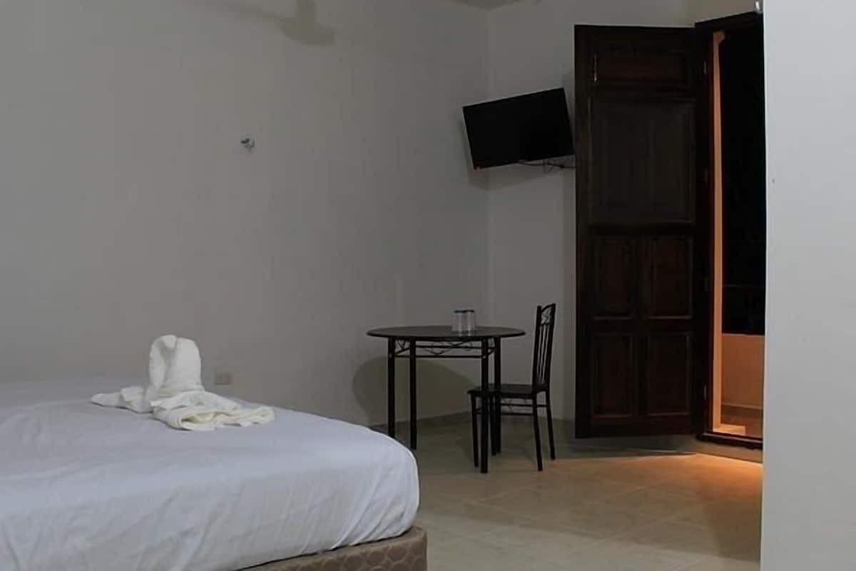Premium bedding, desk, iron/ironing board, free WiFi