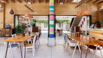 Breakfast, lunch, dinner served; international cuisine, garden views