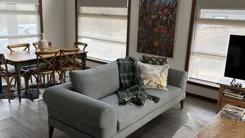 Cottage (Merrijig or River) | Living area | Flat-screen TV