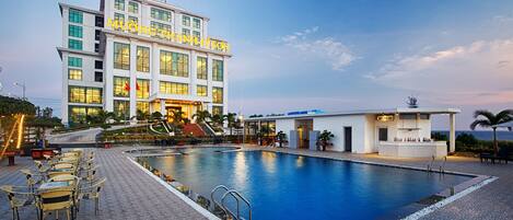 Outdoor pool, open 6:00 AM to 8:00 PM, sun loungers