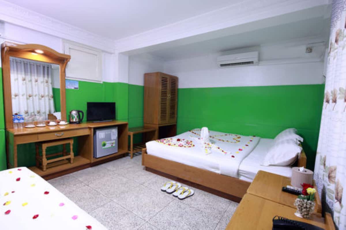 Family Room | Minibar, in-room safe, desk, WiFi (free)