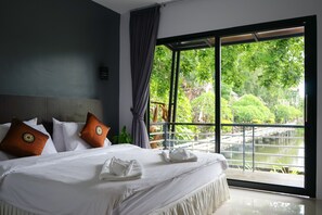 Quarto casal ou duplo família, 2 quartos | Camas extras/dobráveis (sobretaxa), Wi-Fi de cortesia