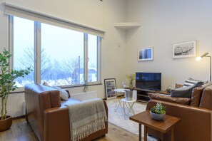 Penthouse, 3 Bedrooms | Living area | LCD TV