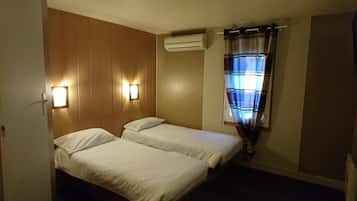 Desk, laptop workspace, free WiFi, bed sheets