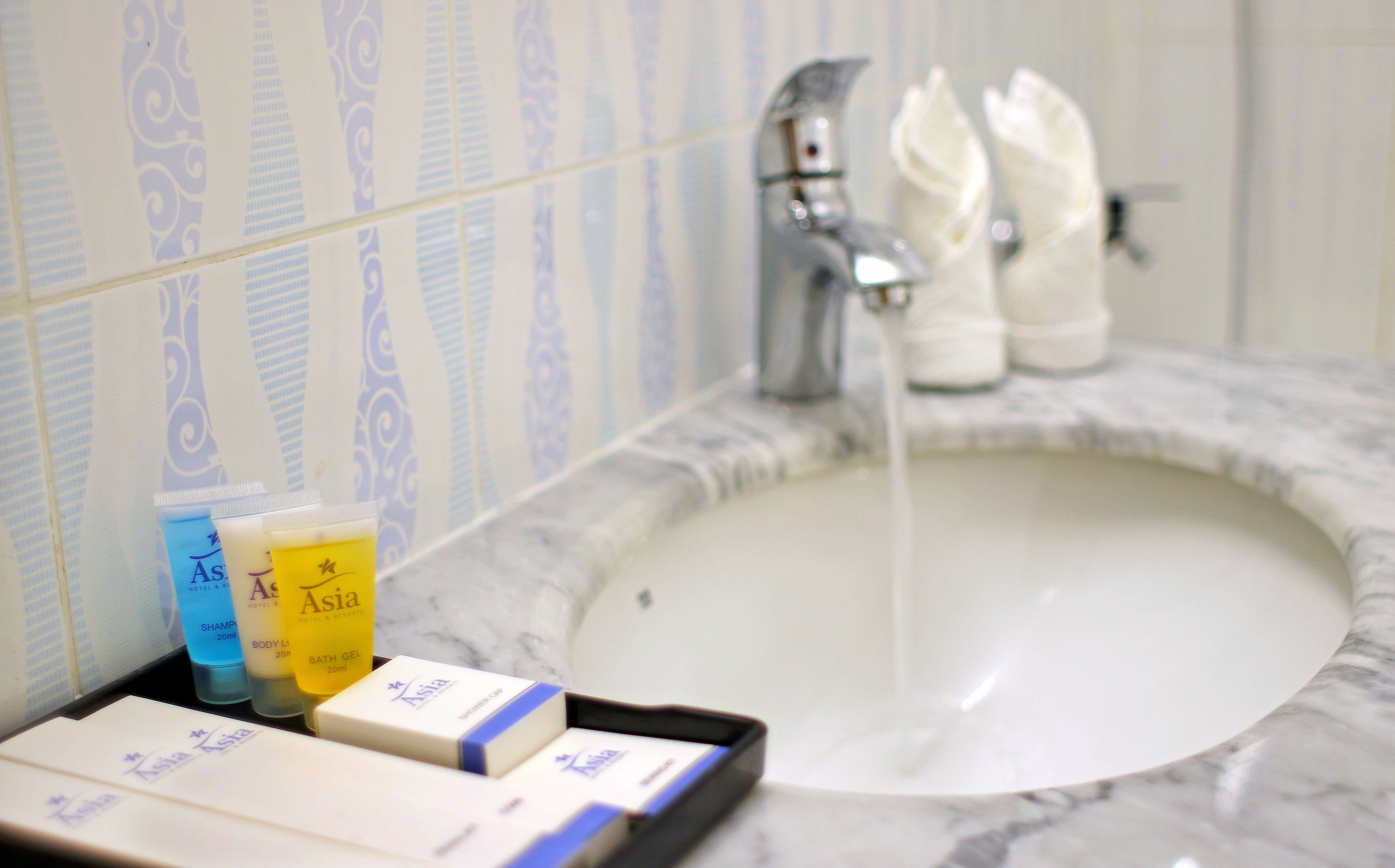 free toiletries, hair dryer, slippers, towels