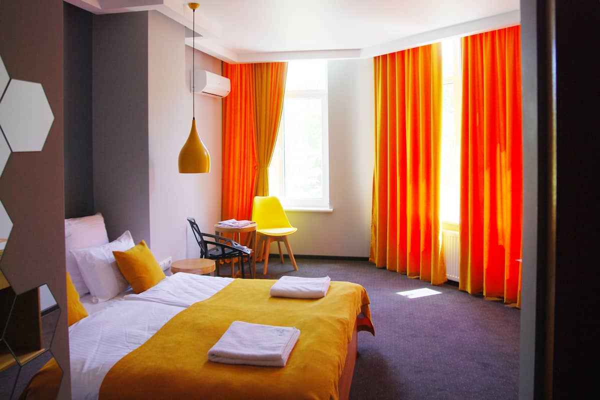 Ropa de cama de alta calidad y minibar