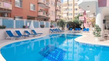 Outdoor pool, open 8:30 AM to 7:30 PM, pool umbrellas, pool loungers