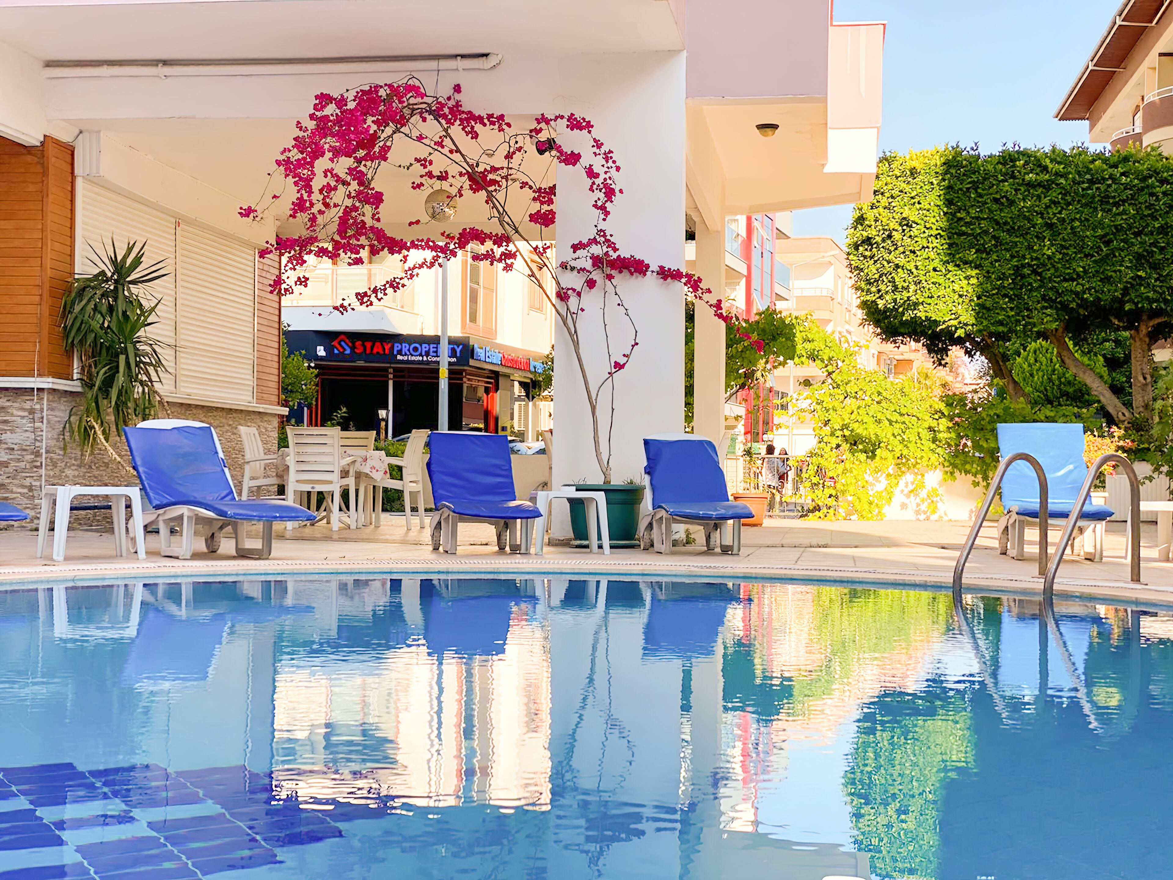 Outdoor pool, open 8:30 AM to 7:30 PM, pool umbrellas, sun loungers