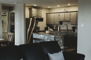 Apartment, Private Bathroom (Riverside Suites) | Private kitchen | Fridge, microwave, coffee/tea maker, electric kettle - Riverside Suites (Grand Falls - Windsor)