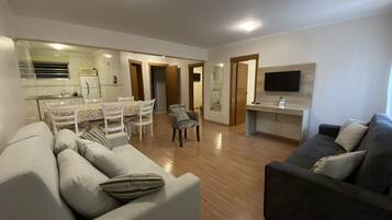 Family Duplex, Courtyard View | Living area | 29-inch LCD TV with cable channels, TV