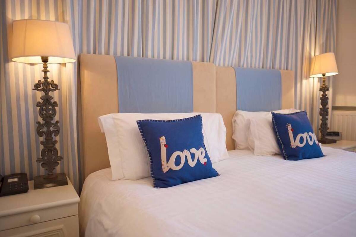 premium bedding, in-room safe, desk, iron/ironing board