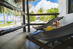 Bungalow, 1 King Bed, Patio, Oceanfront | Terrace/patio