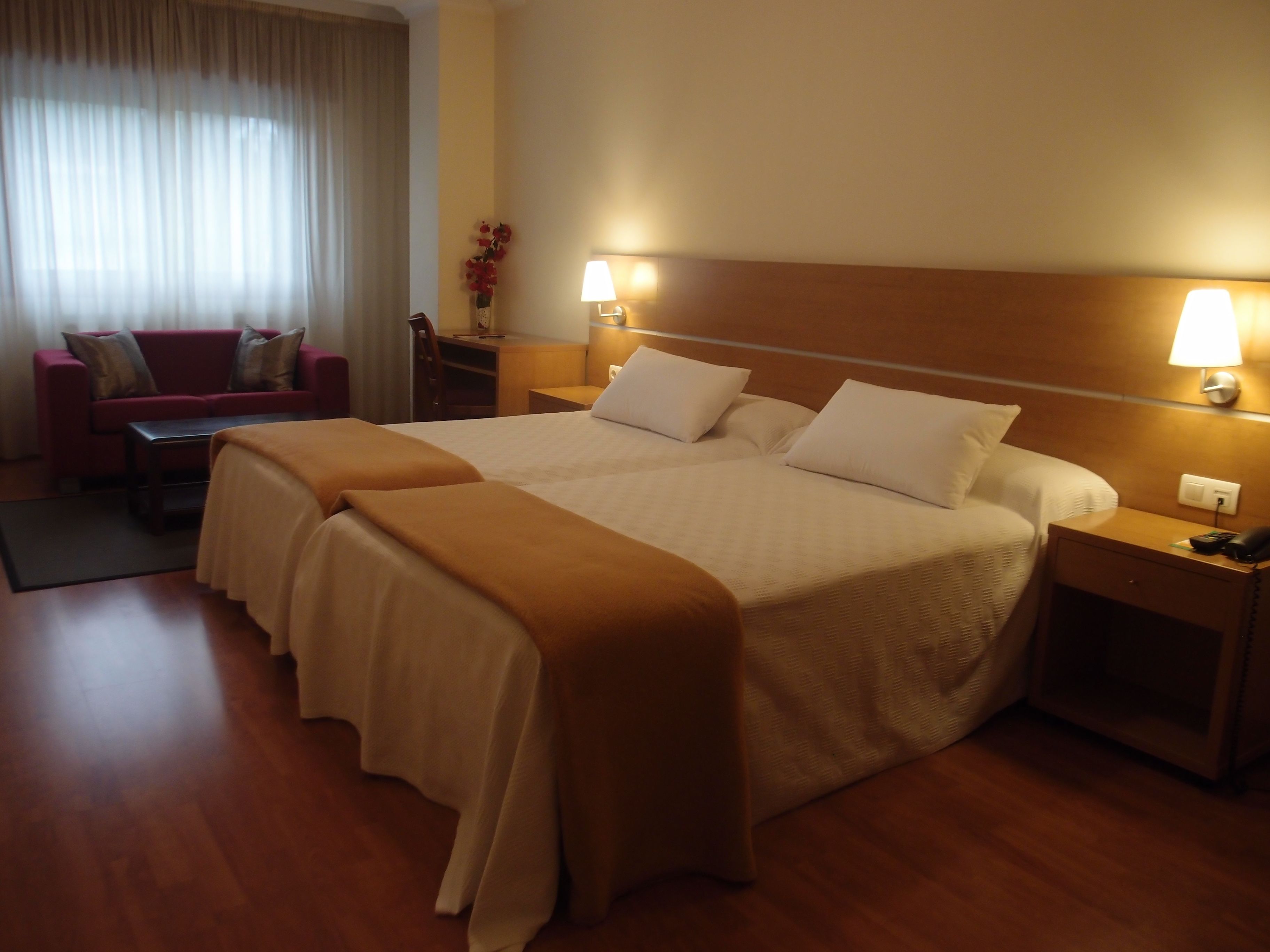 Double or Twin Room | Blackout drapes, iron/ironing board, free cribs/infant beds, free WiFi