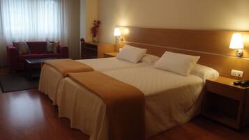 Double or Twin Room | Blackout drapes, iron/ironing board, free cribs/infant beds, free WiFi