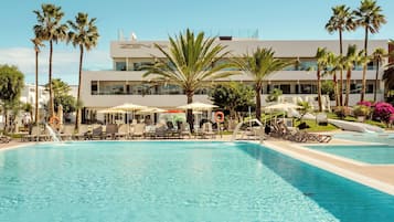 Outdoor pool, an infinity pool, pool loungers