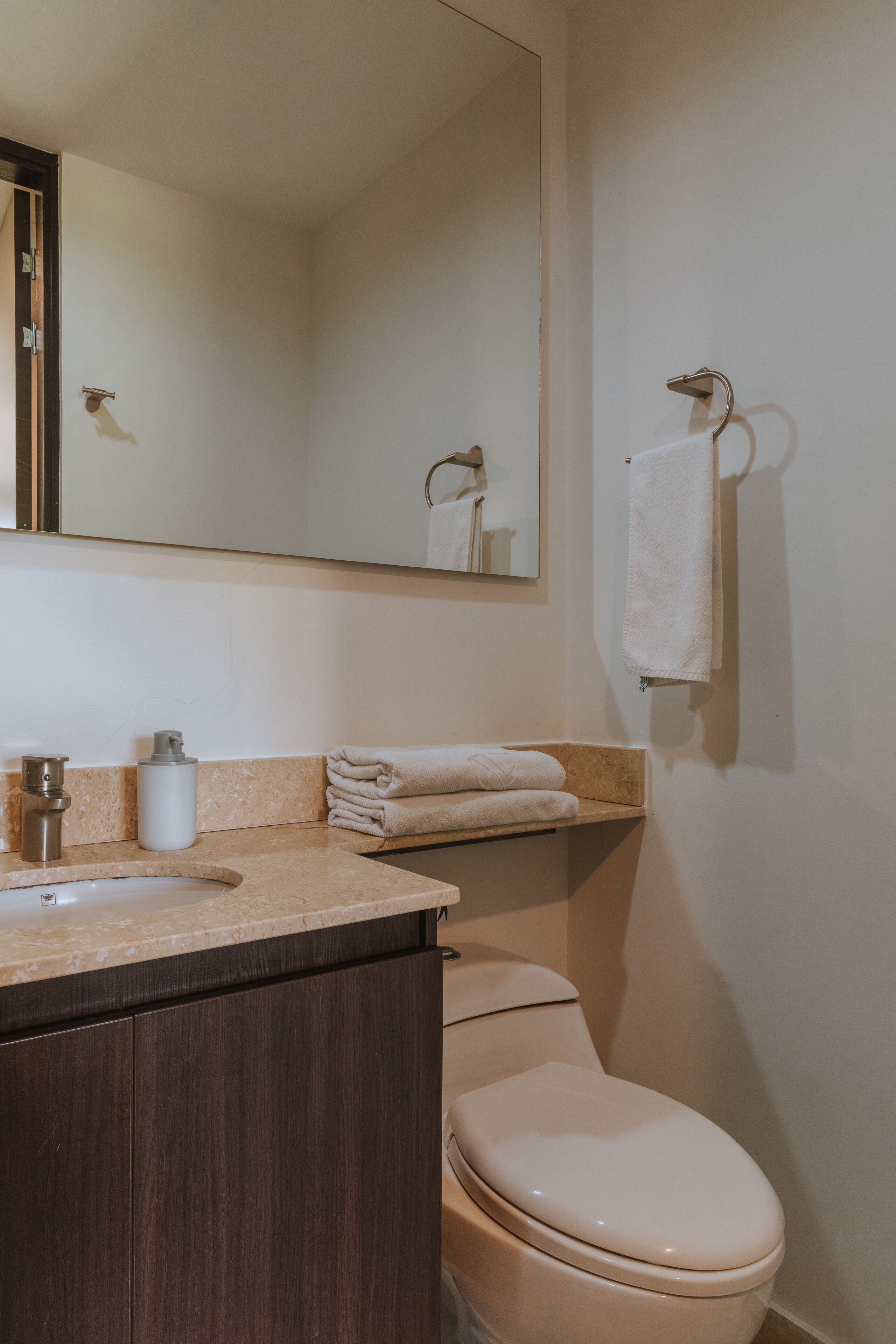 junior suite | bathroom | shower, hair dryer, towels, soap