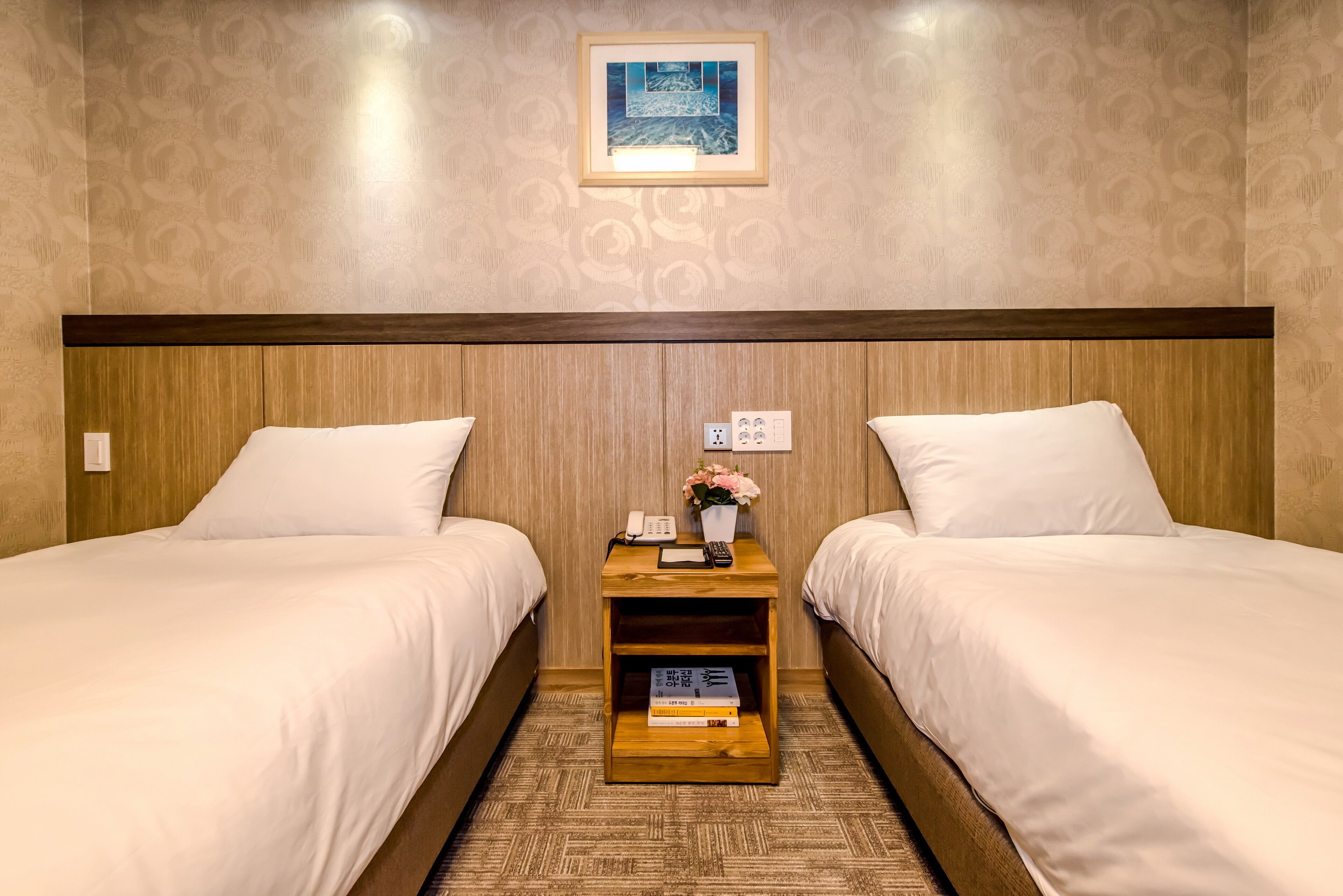 standard twin room | premium bedding, down duvets, in-room safe, desk