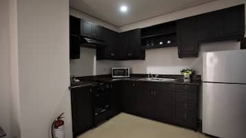 Premier Suite, 1 Bedroom | Private kitchen | Fridge, microwave, stovetop, coffee/tea maker