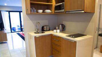Premier Room, 1 Bedroom, Kitchenette | Private kitchen | Fridge, coffee/tea maker, electric kettle