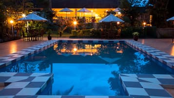 Outdoor pool, open 9:00 AM to 7:00 PM, pool umbrellas, pool loungers