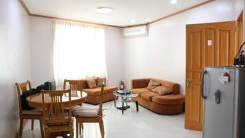 Apartment, 1 Bedroom | Living room | TV