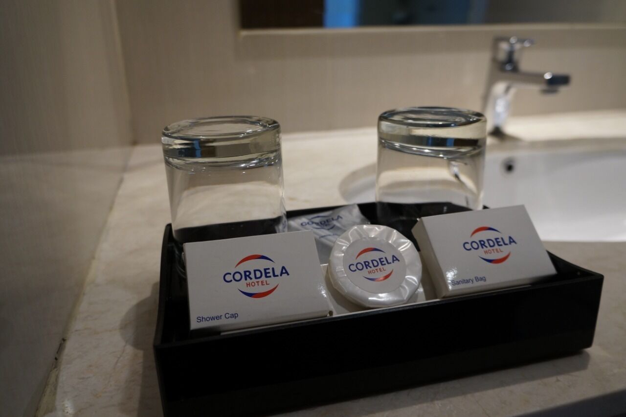 shower, free toiletries, slippers, towels