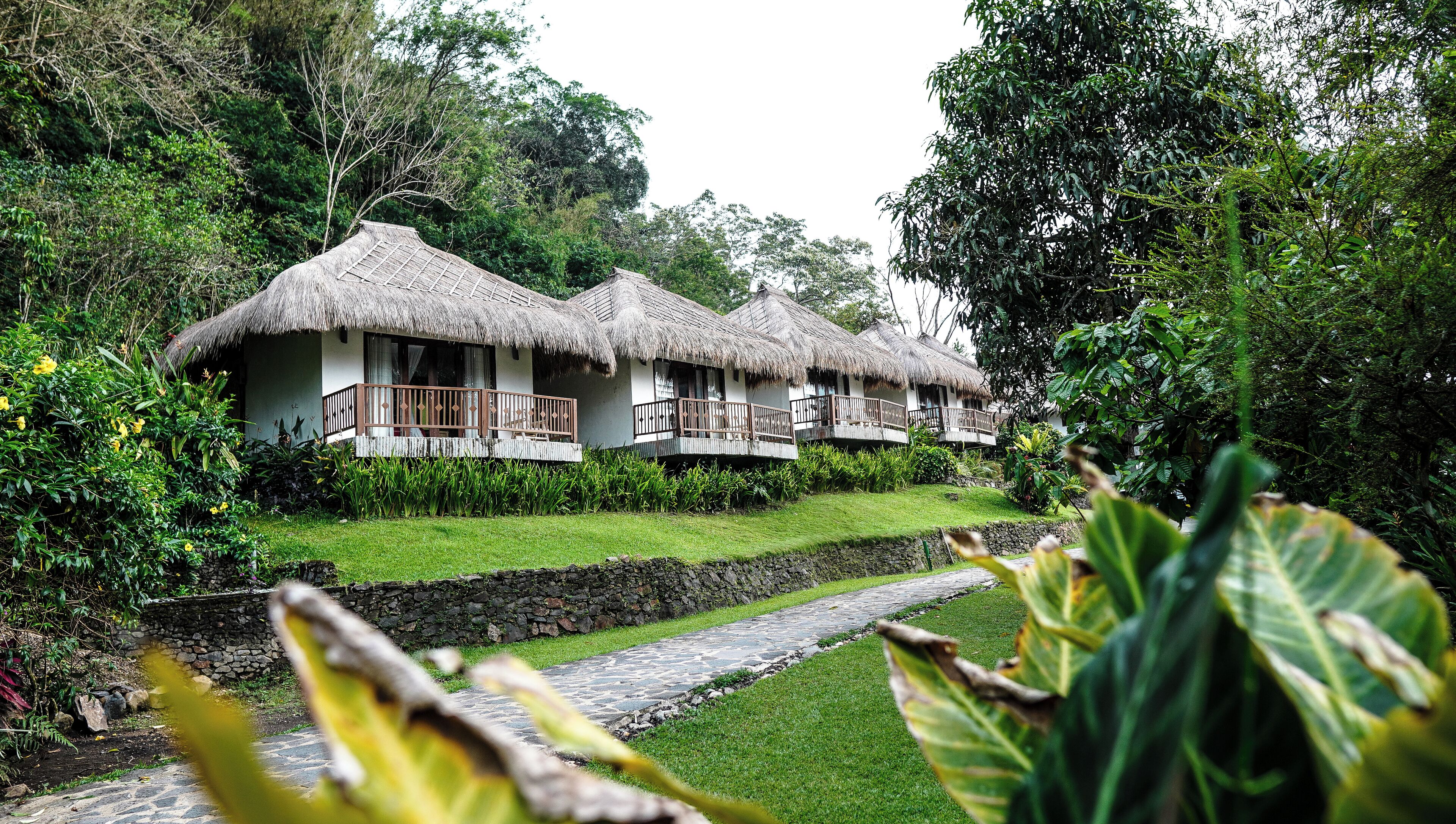 Superior Bungalow, Garden View | Desk, bed sheets