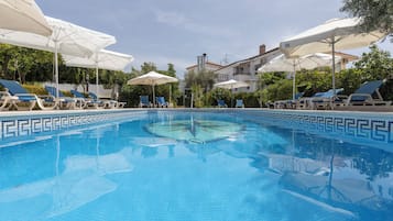 Outdoor pool, pool umbrellas, pool loungers