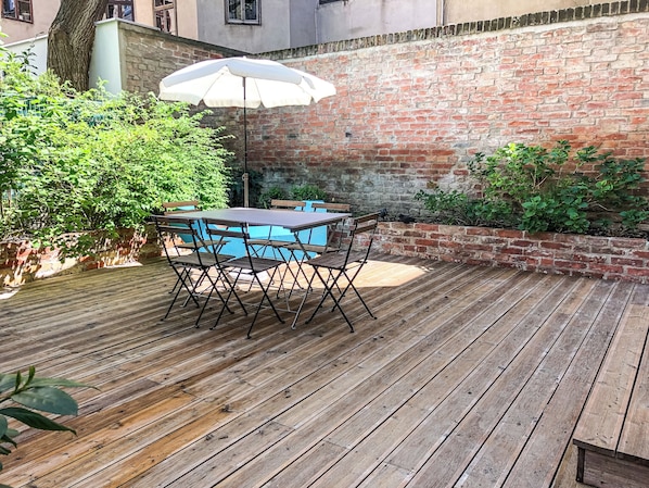 Design-Apartment, 1 Schlafzimmer, Terrasse, zum Garten hin | Terrasse/Patio