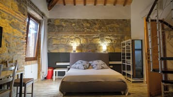 Family Room | 1 bedroom, down comforters, individually decorated, desk