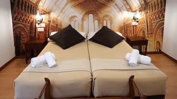 Standard Double Room, Private Bathroom | Minibar, individually decorated, desk, laptop workspace