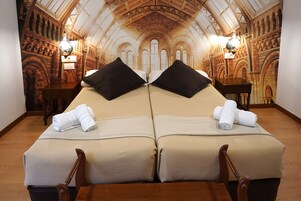 Standard Double Room, Private Bathroom | Minibar, individually decorated, desk, laptop workspace