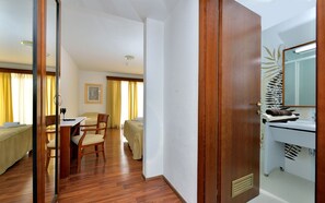 Triple Room | Living area | Flat-screen TV