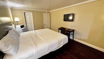 Room, 1 Queen Bed | In-room safe, desk, iron/ironing board, free WiFi