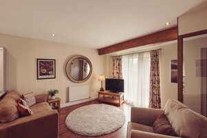 Luxury Cottage, 1 Bedroom, Kitchen, Garden Area | Living area | LCD TV