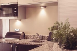 Luxury Cottage, 1 Bedroom, Kitchen, Garden Area | Private kitchen - Longlands Inn and Restaurant (Carnforth)